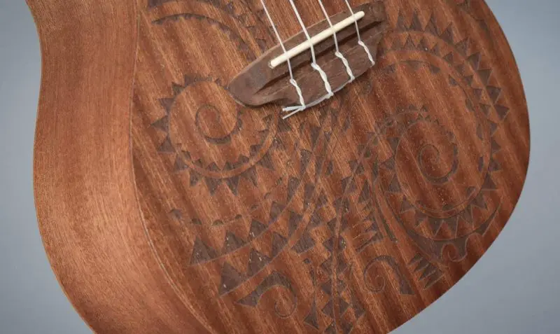 Luna Tattoo ukulele tattoo engraving